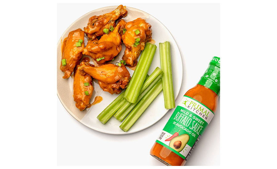 https://www.preparedfoods.com/ext/resources/2023/07/19/Primal_Kitchen_Mild_and_Sweet_Buffalo_Sauce_Wings.jpg