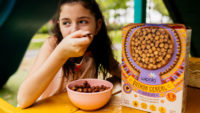 Girl Eating Quinoa Cereal