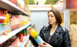 Woman Holding a Beverage