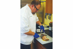 man slicing meat, safe meat